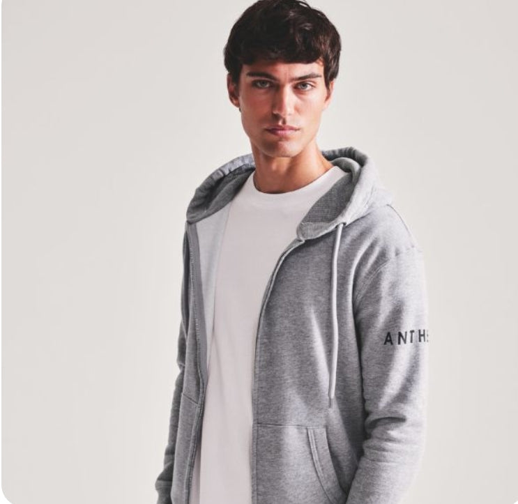 Model wearing Anthem clothing full zip hoodie - Color Coded Workwear