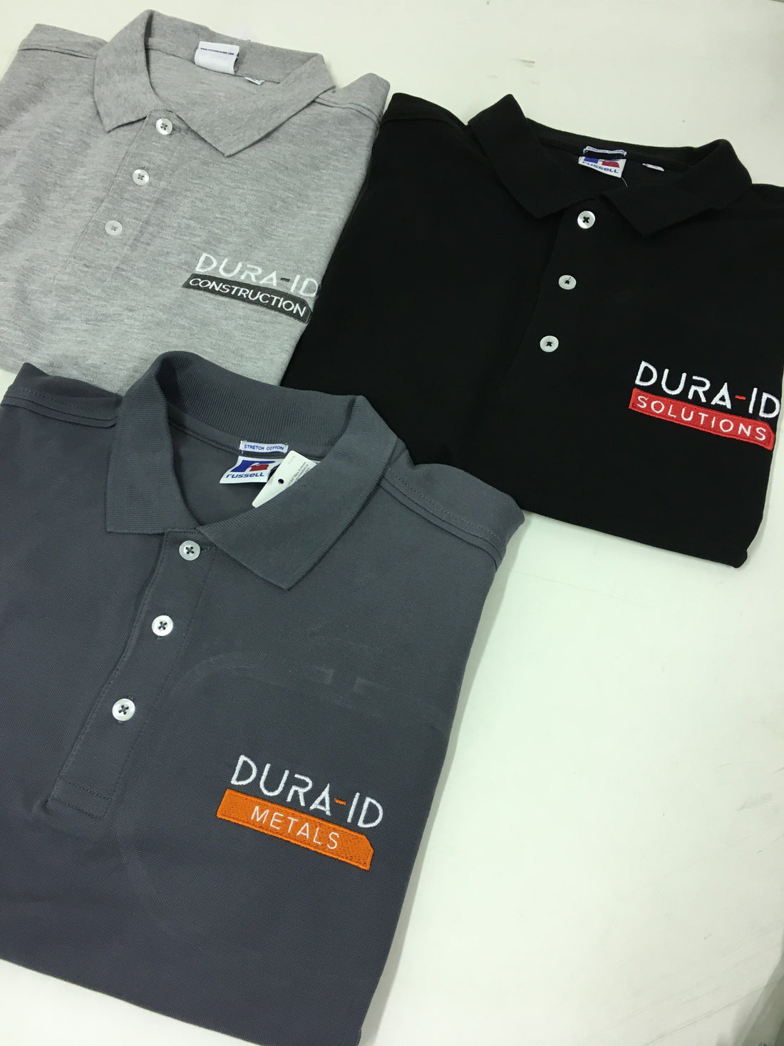 Russell Polo shirts with embroidered logos - Color Coded Workwear
