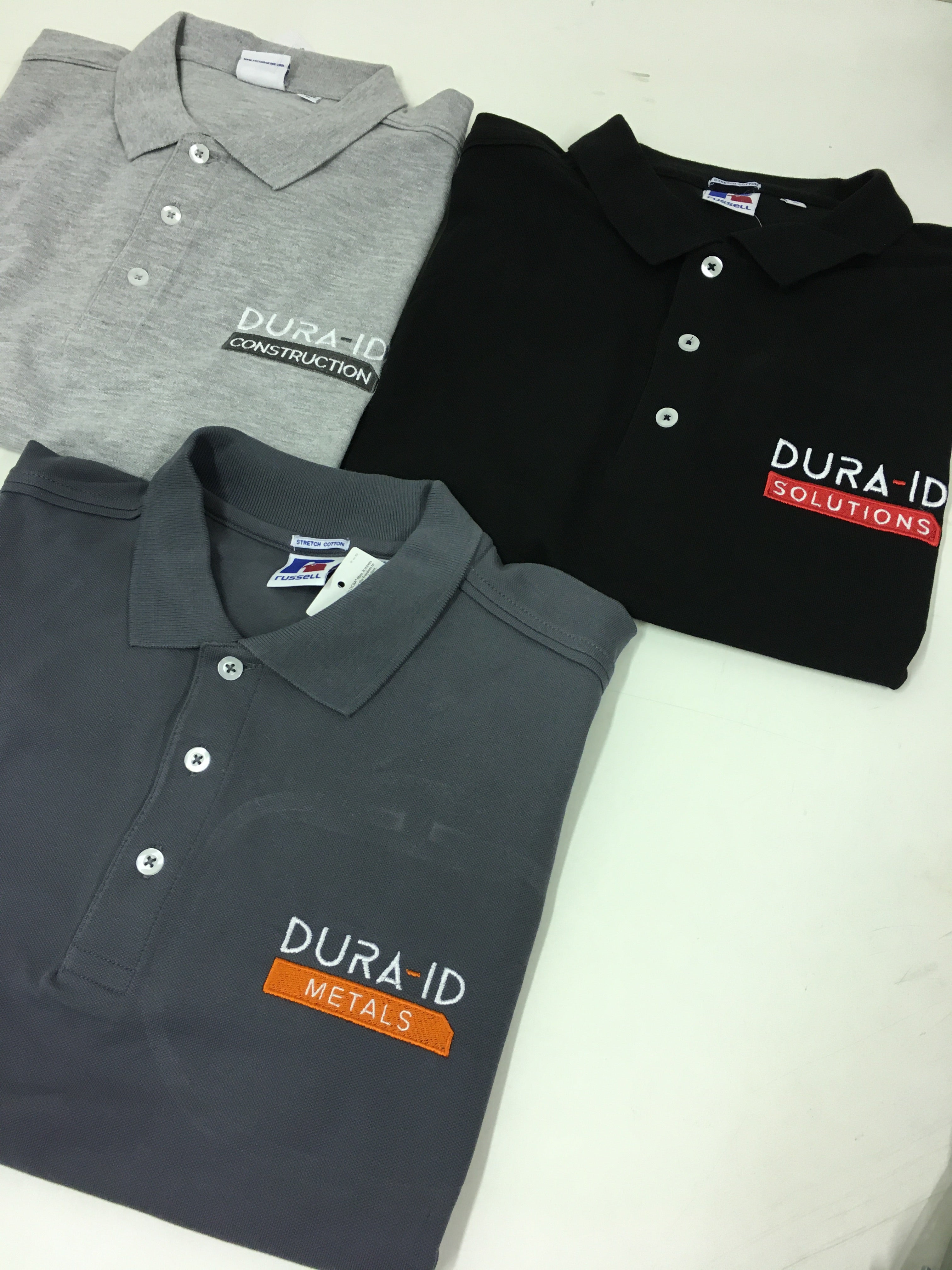 Russell Polo shirts with embroidered logos - Color Coded Workwear