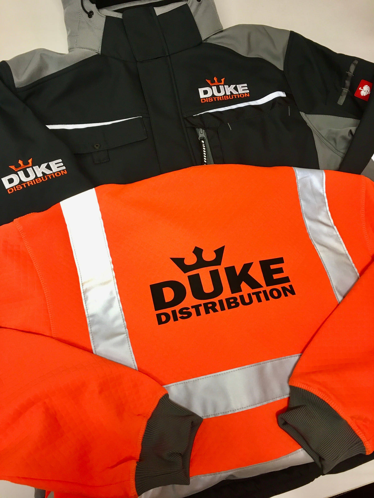 Embroidered and printed logos on durable, hard wearing workwear for UK national haulier
