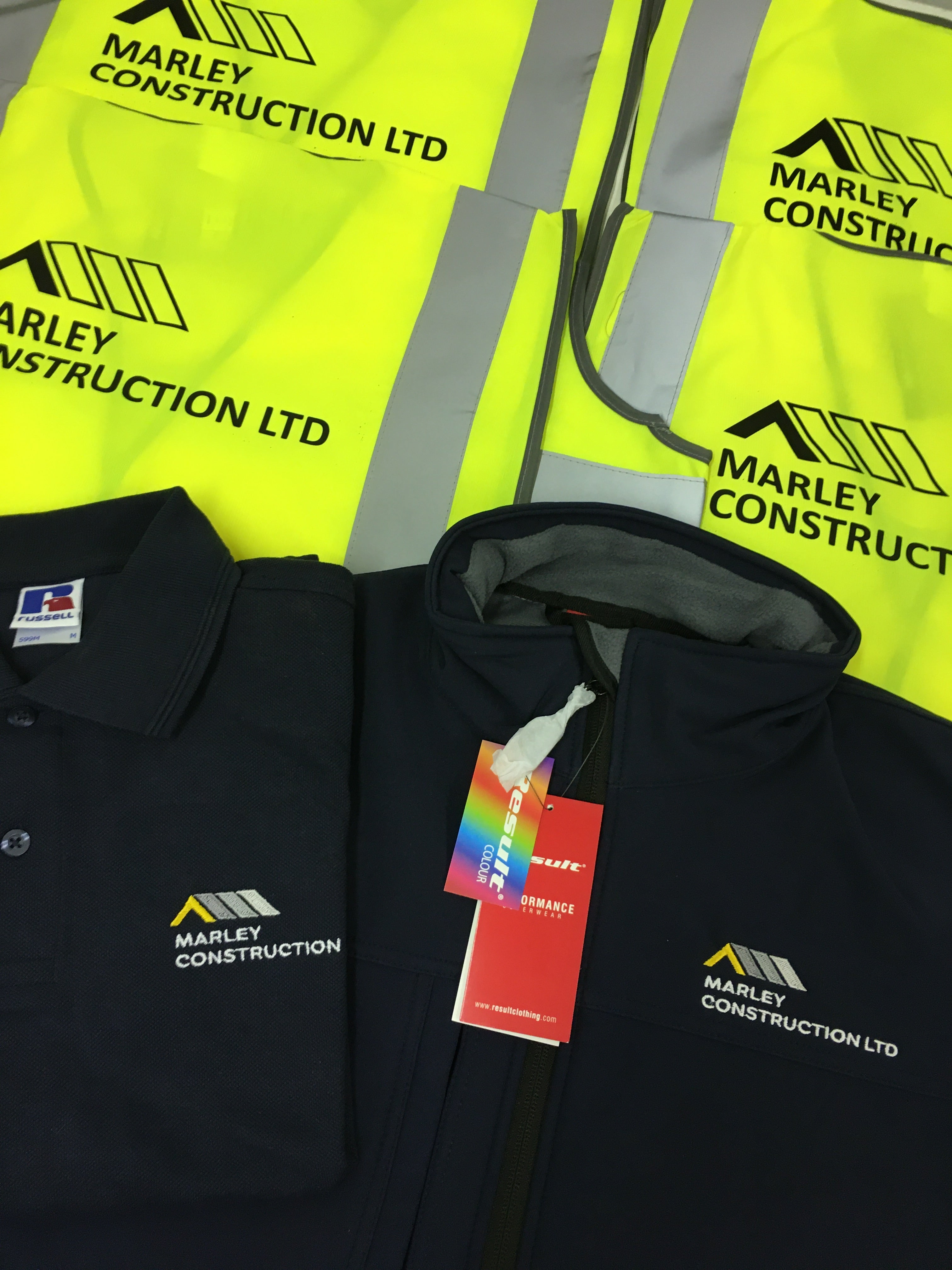 Embroidered and Printed logos on Yellow hi-vis vests - Color Coded Workwear