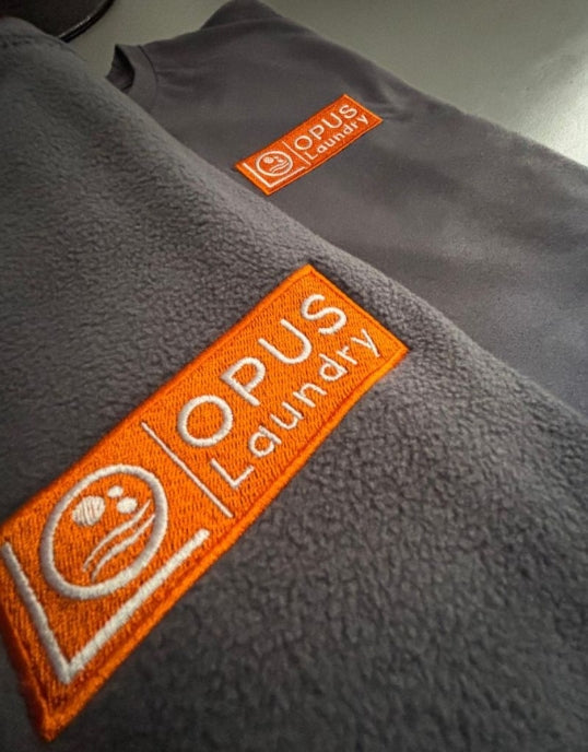 Close up of professional embroidered logo by Color Coded Workwear