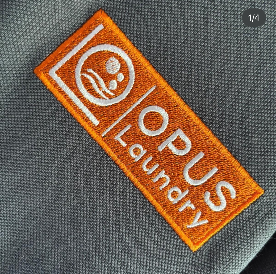 Embroidered left chest logo on Russell 599M polos supplied and branded by ColorCoded Workwear. Premium embroidered logos.