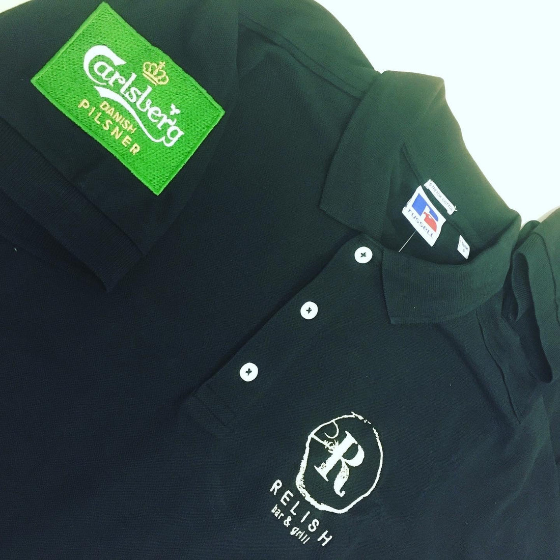Black polo with embroidered logos - ColorCoded Workwear