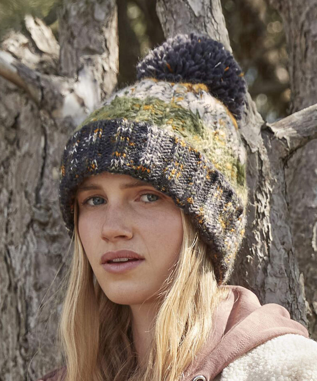 Model wearing Beechfield Corkscrew pom pom beanie - ColorCoded Workwear